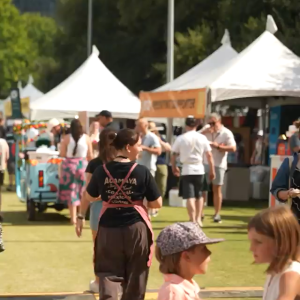 Food trucks and people at a fair