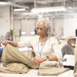 person working to make clothing