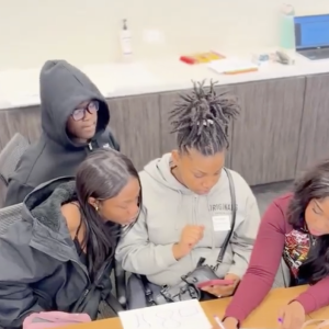 Four students working together