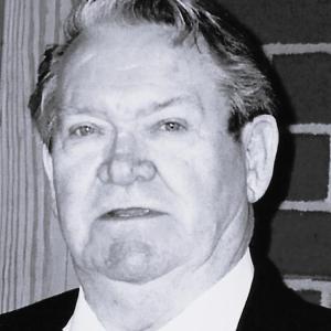 Black and white headshot of a man