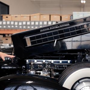 Lori with an old-fashioned car