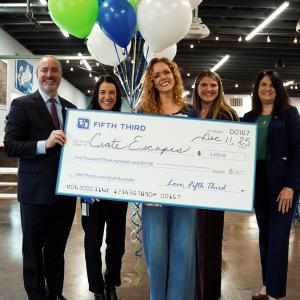 Crate Escapes Dog Park receiving grant check from Fifth Third