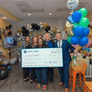 Let’s Celebrate! receiving grant check from Fifth Third