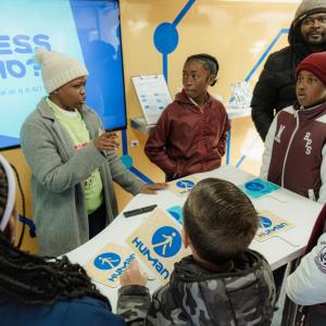 Students interact with the Curiosity Cube