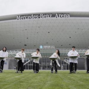 Aether band performs in front of Mercedes-Benz Arena Shanghai.