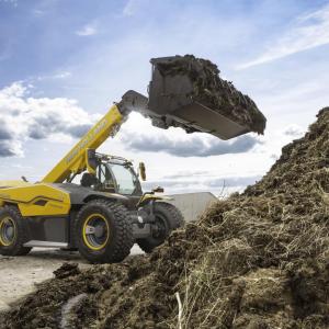hybrid full-size telehandler prototype lifting dirt