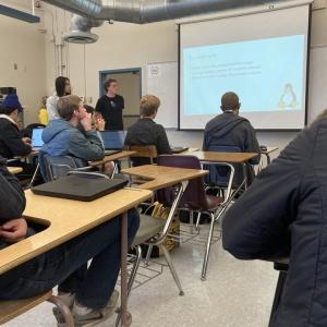 students learning from a powerpoint