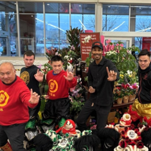 People posing at ACME store