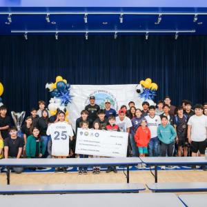 Martha Saucedo, Chief External Affairs Officer of AEG, presented the Coachella Valley Unified School District’s Migrant Program with a check donation in the amount of $5,000.