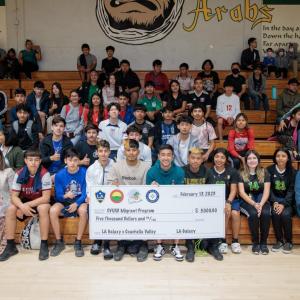 LA Galaxy's Jose “Memo” Rodriguez poses with migrant student athletes from CVUSD.