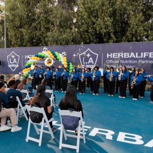 Students from Jordan High School's marching band performed at the ceremony.