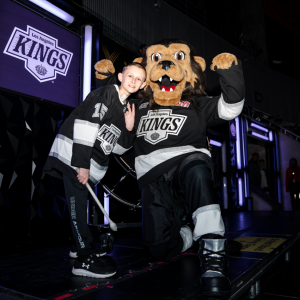 Joshua joined King’s mascot Bailey for a 3rd period drum moment with the crowd.