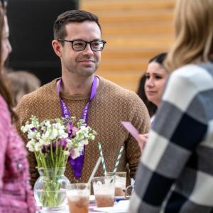 People stood around a table