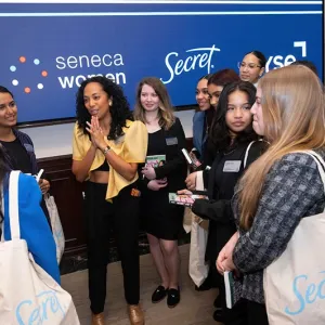 Group photo of event attendees talking in a group