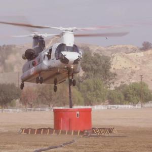 Each CH-47 helitanker can drop 3,000-gallon payloads of water or fire retardant and fill their tanks with a retractable snorkel while hovering, allowing for a faster return to the fire line.