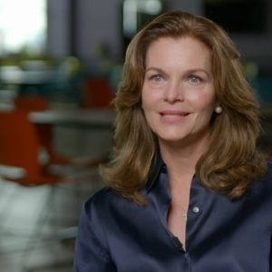 Photo of a woman in a navy blue blouse