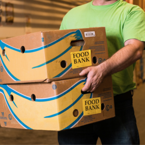 Person carrying two boxes