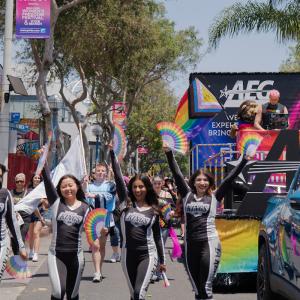 LA Kings Ice Crew march in front of AEG Pride float
