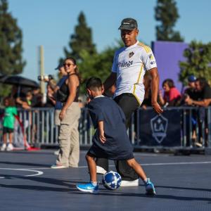 LA Galaxy players Jalen Neal, Edwin Cerrillo, and Mauricio Cuevas led a soccer clinic for more than 50 youth soccer players from Rio Vista Elementary.