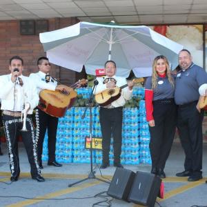 Mariachi band performs outside of Jewel-Osco store.