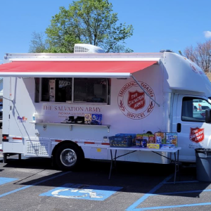 FedEx canteen truck set up with a food and drink station 