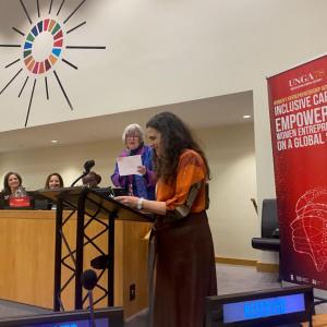 People speaking on stage