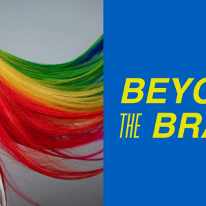 A person with long rainbow hair and the phrase: Beyond the Brand