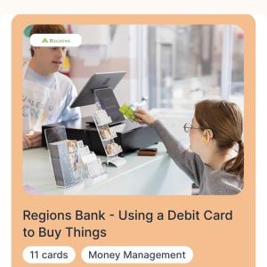 A person using their debt card at a till 