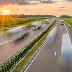 vehicles driving down a highway