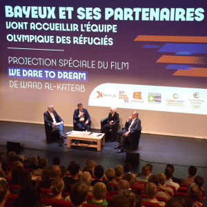 Four people on a stage