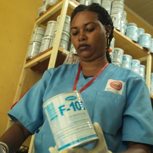 Action Against Hunger nurse Ware Arbale, 27, makes therapeutic milk to give to malnourished children.