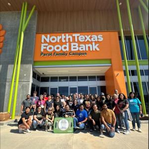 Group of people posing outside North Texas Food Bank