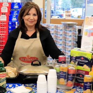 Someone posing at an italian food booth