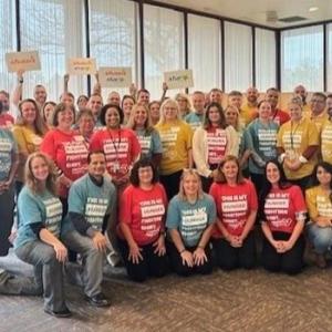 A group of people posing for a photo