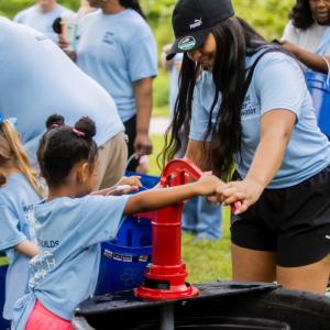 Pumping water at Walk for Water