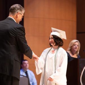 Student receiving diploma