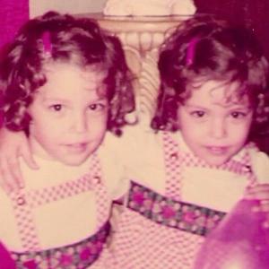 Wanda with her twin sister Yolanda, around the age of four