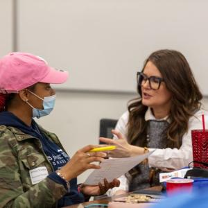 Whirlpool mentor talks with Benton Harbor High School student