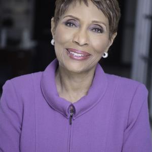 Juanita Baranco in a purple jacket