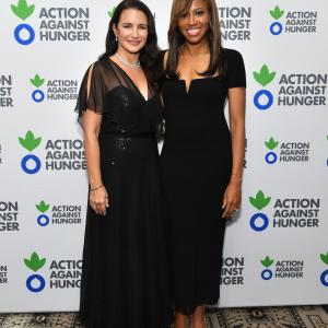 Kristin Davis and Zain Asher pose for a photo.