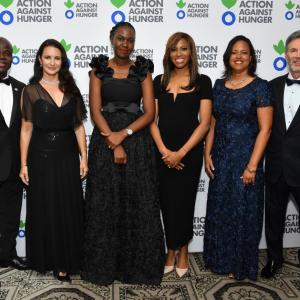 Dr. Charles Owubah, Kristin Davis, Ritah Kabanyoro, Zain Asher, Alicia Procello and Raymond Debbane pose for a photo. 