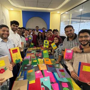 The Gen team working to reuse paper to donate notebooks