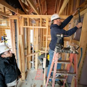 Arrow employees helping build a home with Habitat for Humanity 