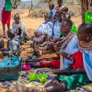 Women attend a support group meeting. 