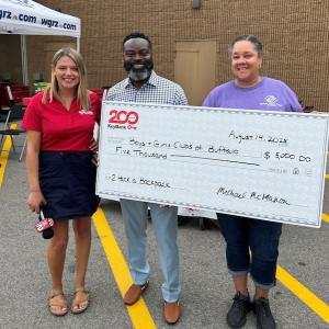KeyBank and Boys & Girls Clubs of Buffalo shown with a $5,000 check.