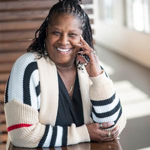 Benita Harrington sat at a table