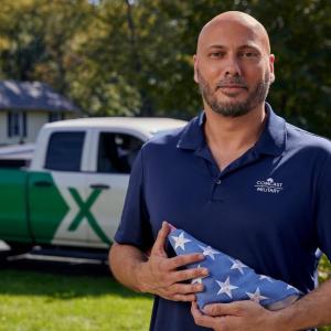 person holding American flag
