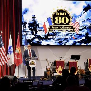 A person talking on stage 