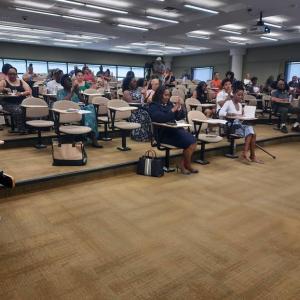 People sitting in chairs.