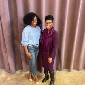 Two people standing together